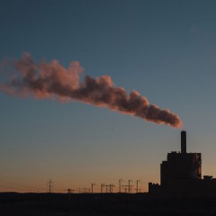 A plume of smoke billows out of the coal fired Keephills Power Station in Wabamun, Alberta at sunset.