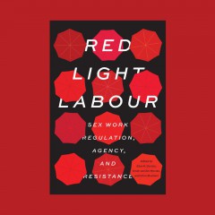 A book cover with red umbrellas against a black background.